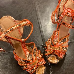 Pink snake skin heels